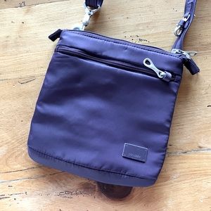 Purple pacsafe crossbody bag